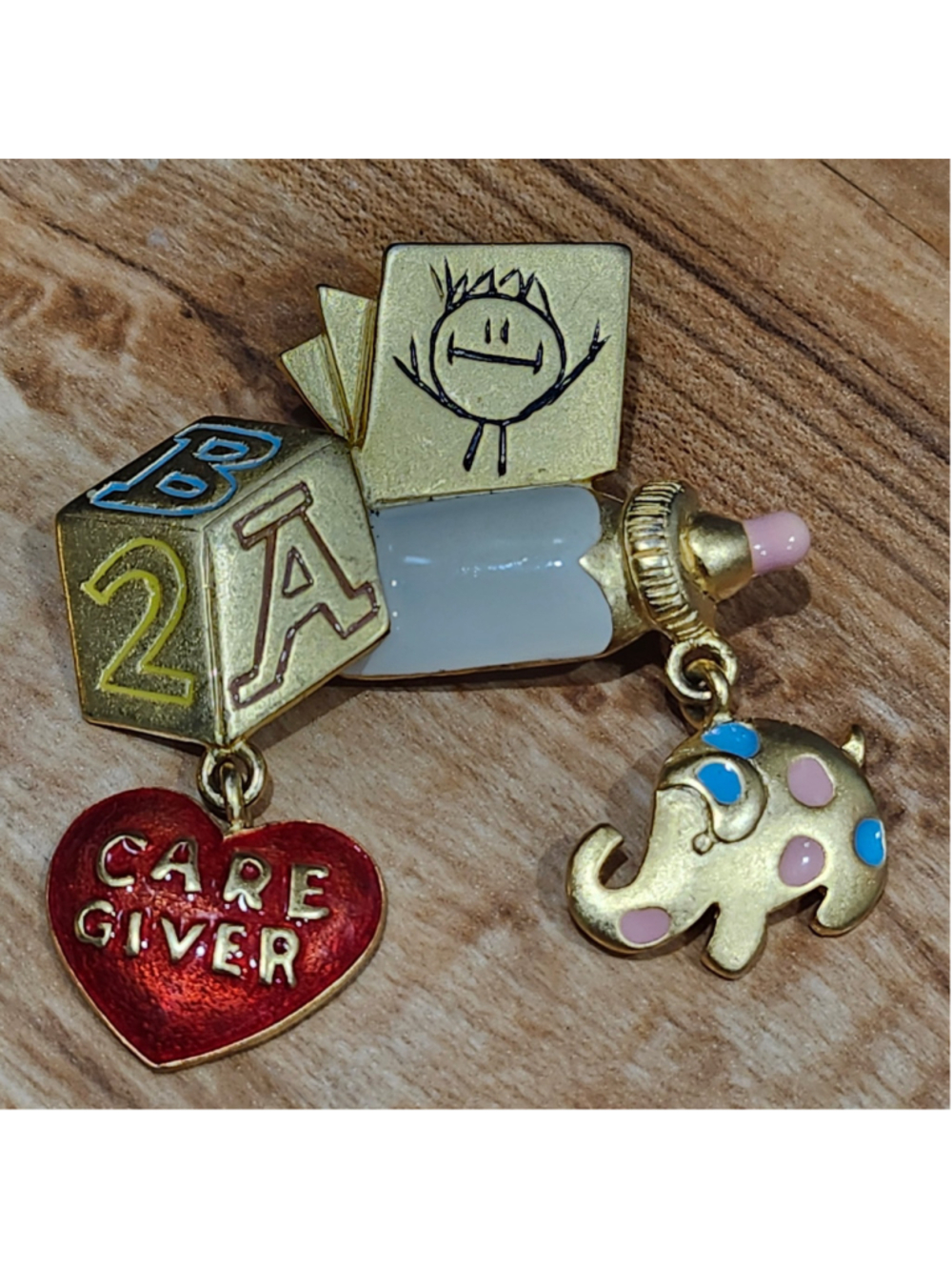 TONA GOLD TONE NANNY INFANT CARE GIVER CHARM BROOCH